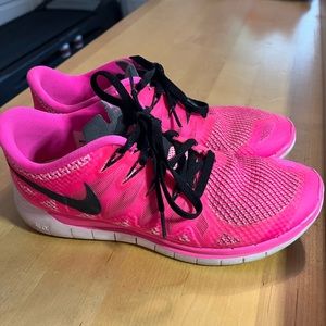 Gently used Nike tennis shoes, super cute pink! only worn in the studio!